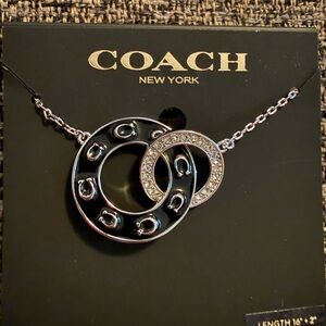 Coach Black and Silver Circle Pendant Necklace